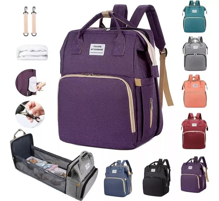 Mochila, cuna y bolsa de pañales