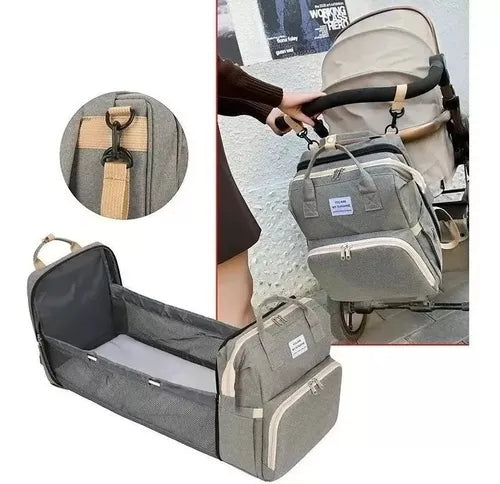 Mochila, cuna y bolsa de pañales